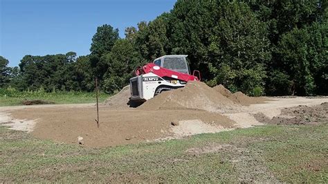 building house pad with skid steer|building a house pad youtube.